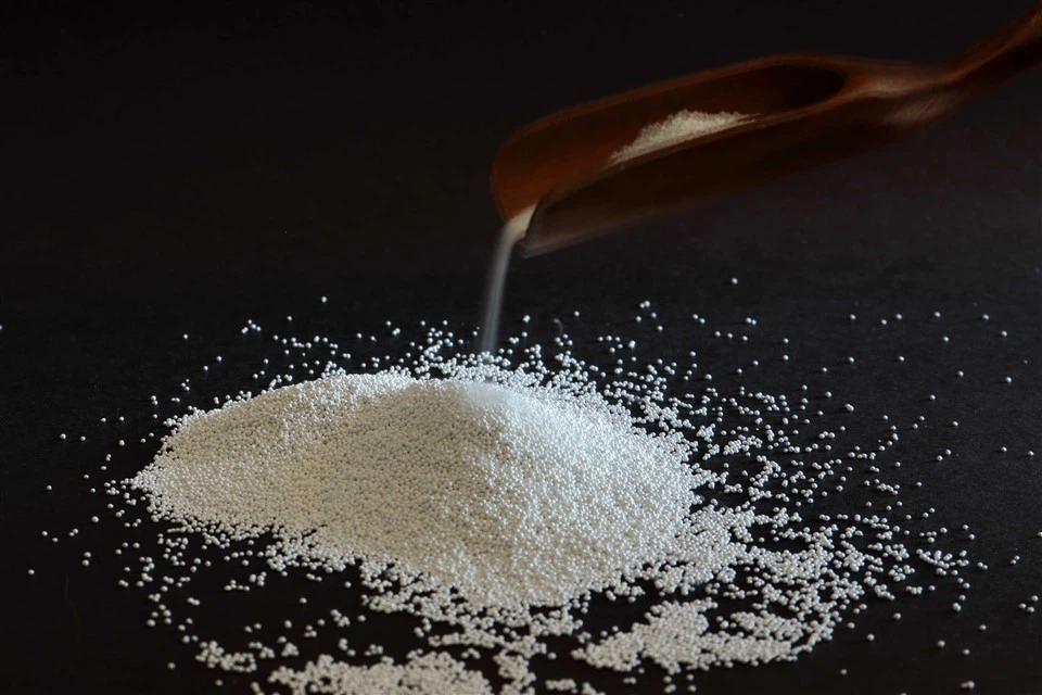 Επεξεργασία σφαιριδίων πυριτικού ζιρκονίου με πληρωτικά χαρτιού